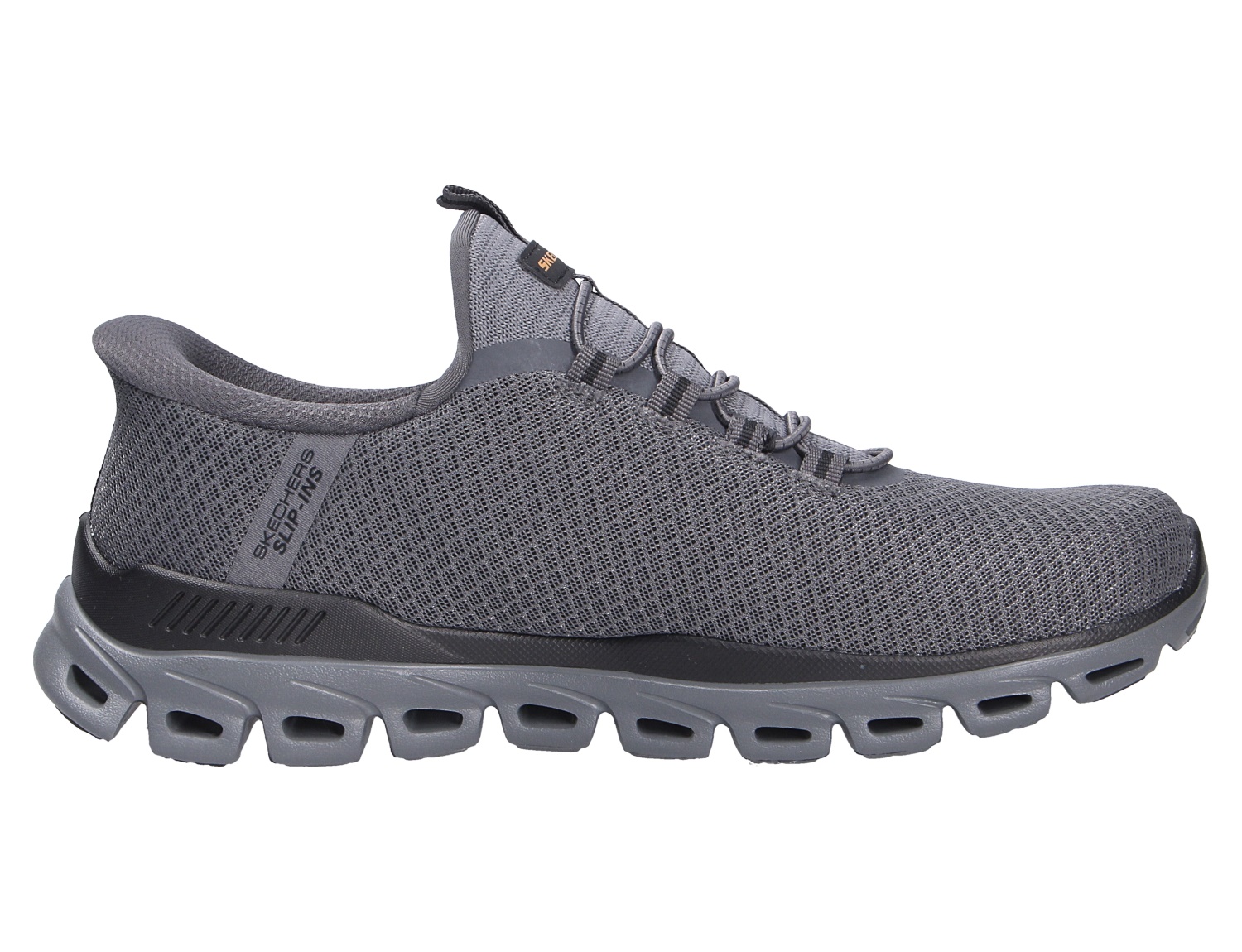 Seitenansicht des Skechers Glide Step Noxus: grauer Herren-Sneaker mit atmungsaktivem Mesh-Obermaterial und markanter Glide-Step-Sohle für sportlichen Alltagskomfort