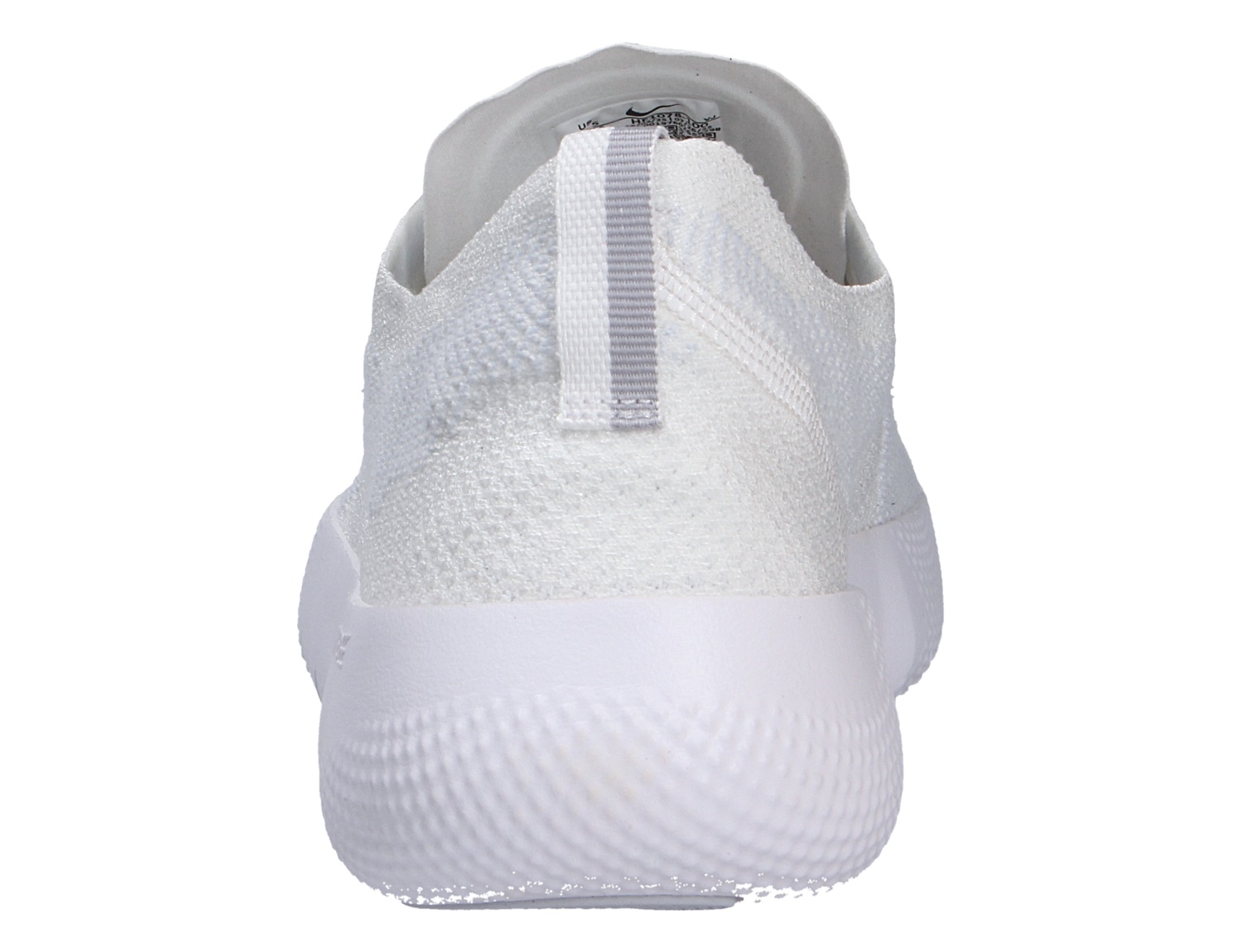 Rückansicht des weißen Nike FREE 2025 Sneakers mit gestricktem Obermaterial, Fersenschlaufe und strukturierter Sohle